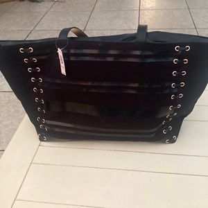 Victoria’s Secret tote fir beach or travel.